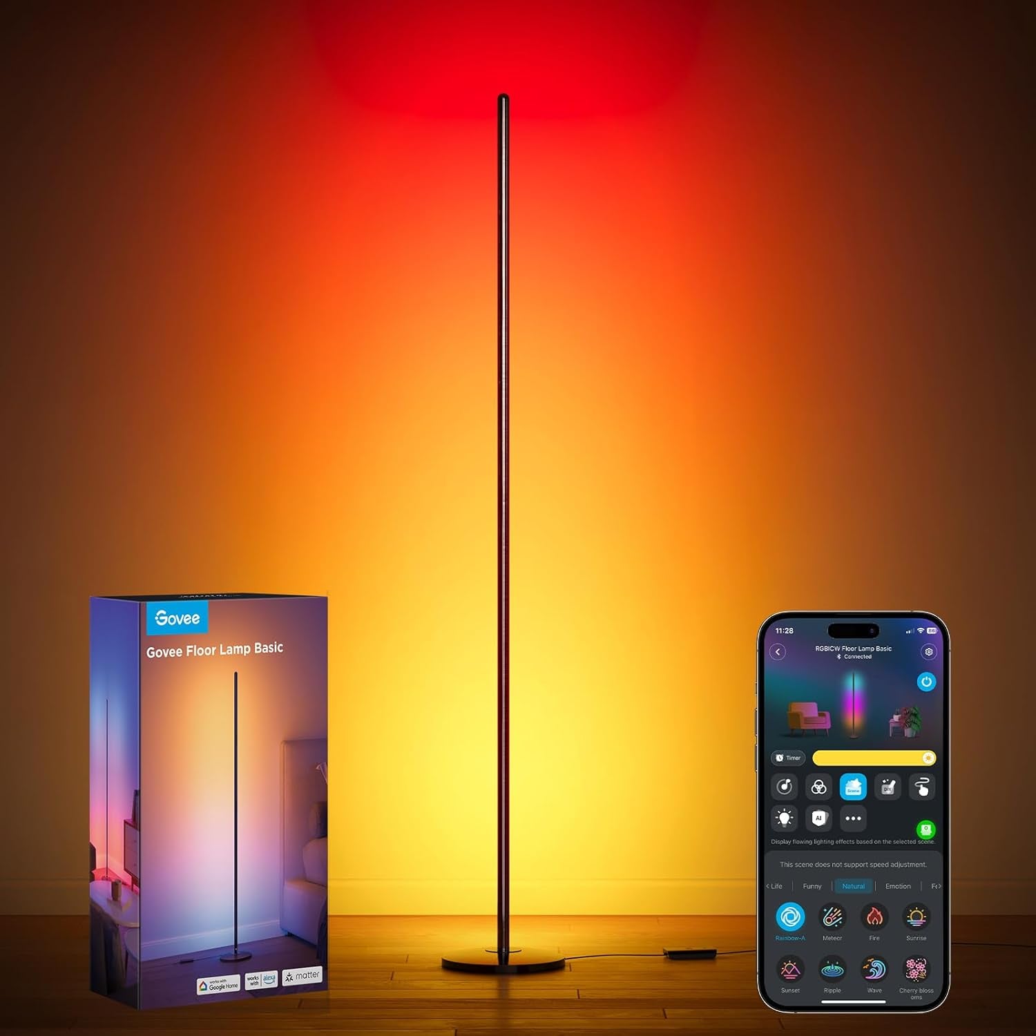 Slim black floor lamp lit with warm orange-red wall gradient, boxed product and smartphone app visible nearby