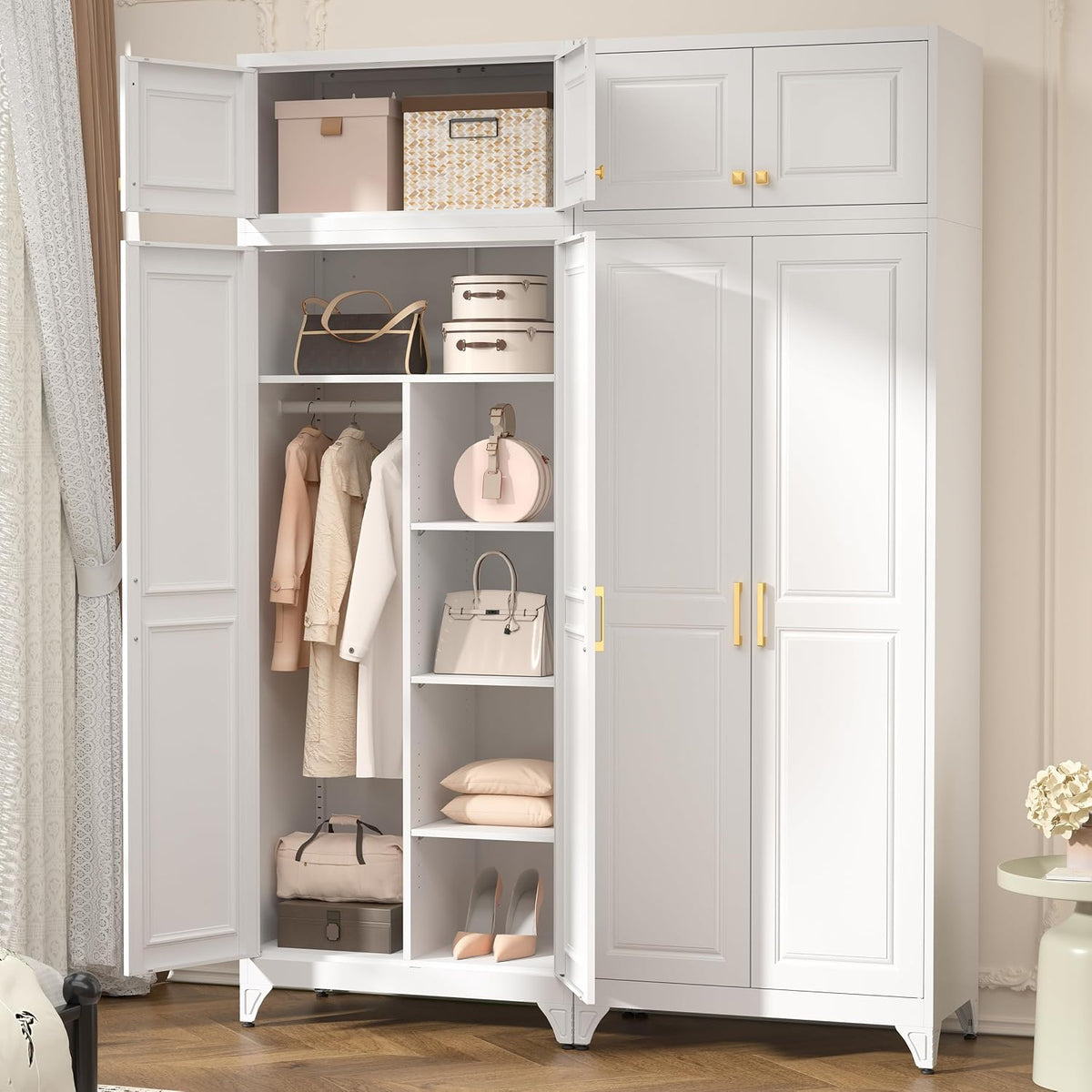 White wardrobe in a softly lit bedroom setting with open doors revealing hanging garments and organized shelves