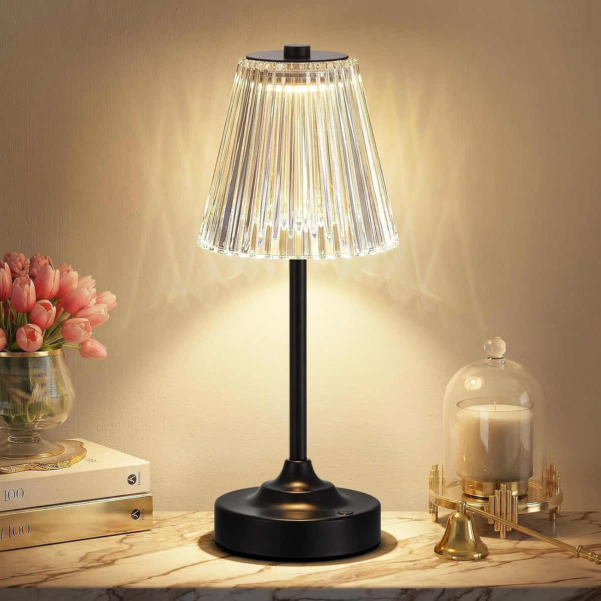 Single lit lamp with a black stem and base, ribbed acrylic shade casting patterned light