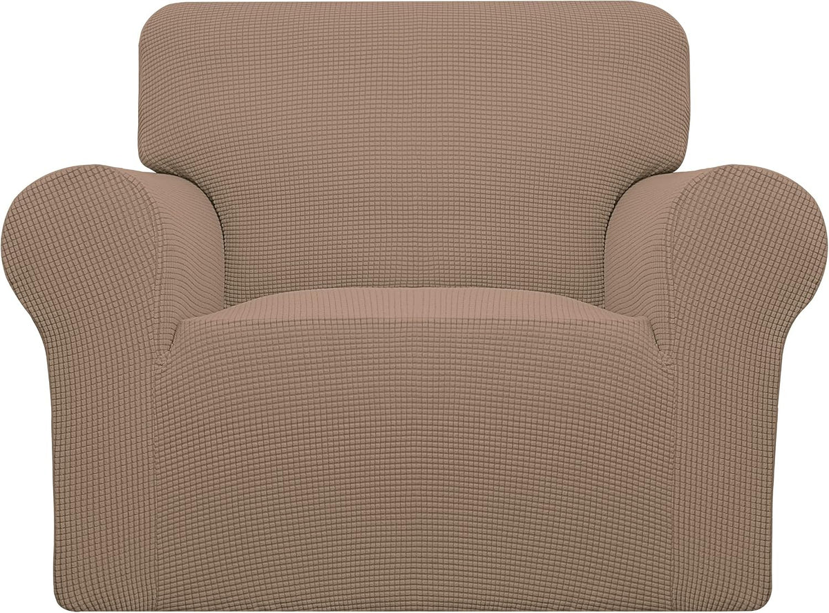 Head-on armchair wrapped in a taupe waffle-textured slipcover with a snug fit over arms and back.