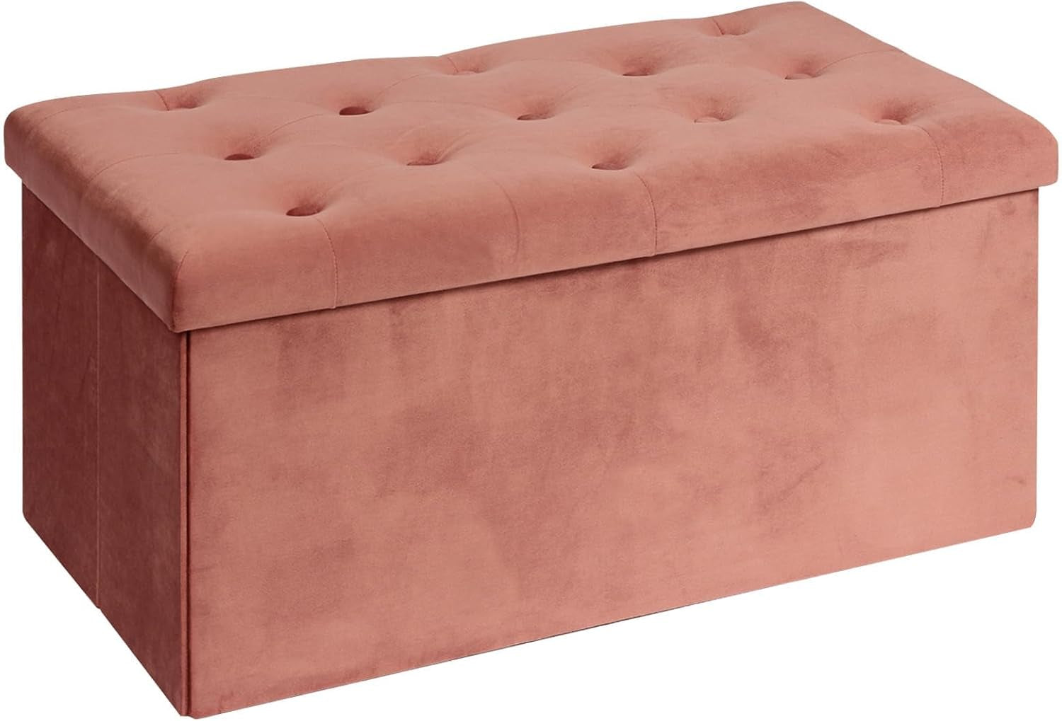 Rectangular pink tufted velvet storage ottoman with lid shown at slight angle