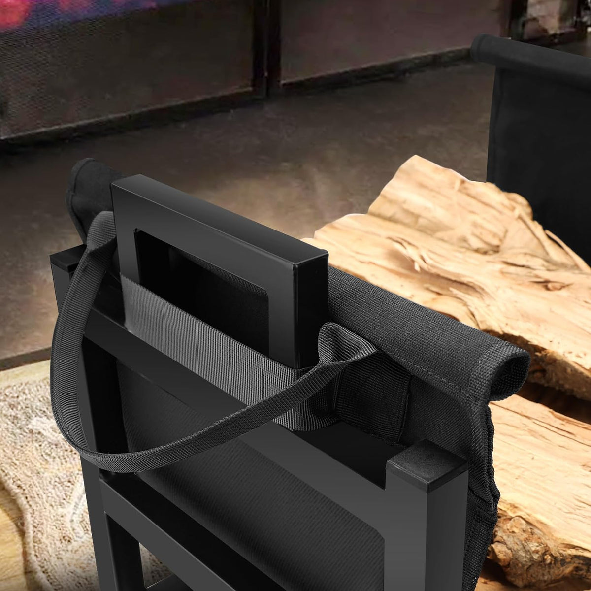 Close-up of the rack's rectangular metal top and the canvas carrier strap looped through the handle