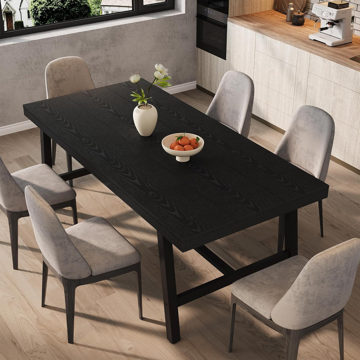 Rectangular dining table with deep black wood-grain top and black metal trestle base, styled with chairs.