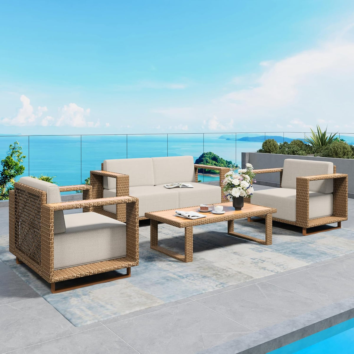 Outdoor patio setup with a three-piece sofa, two armchairs, coffee table on a terrace by the sea