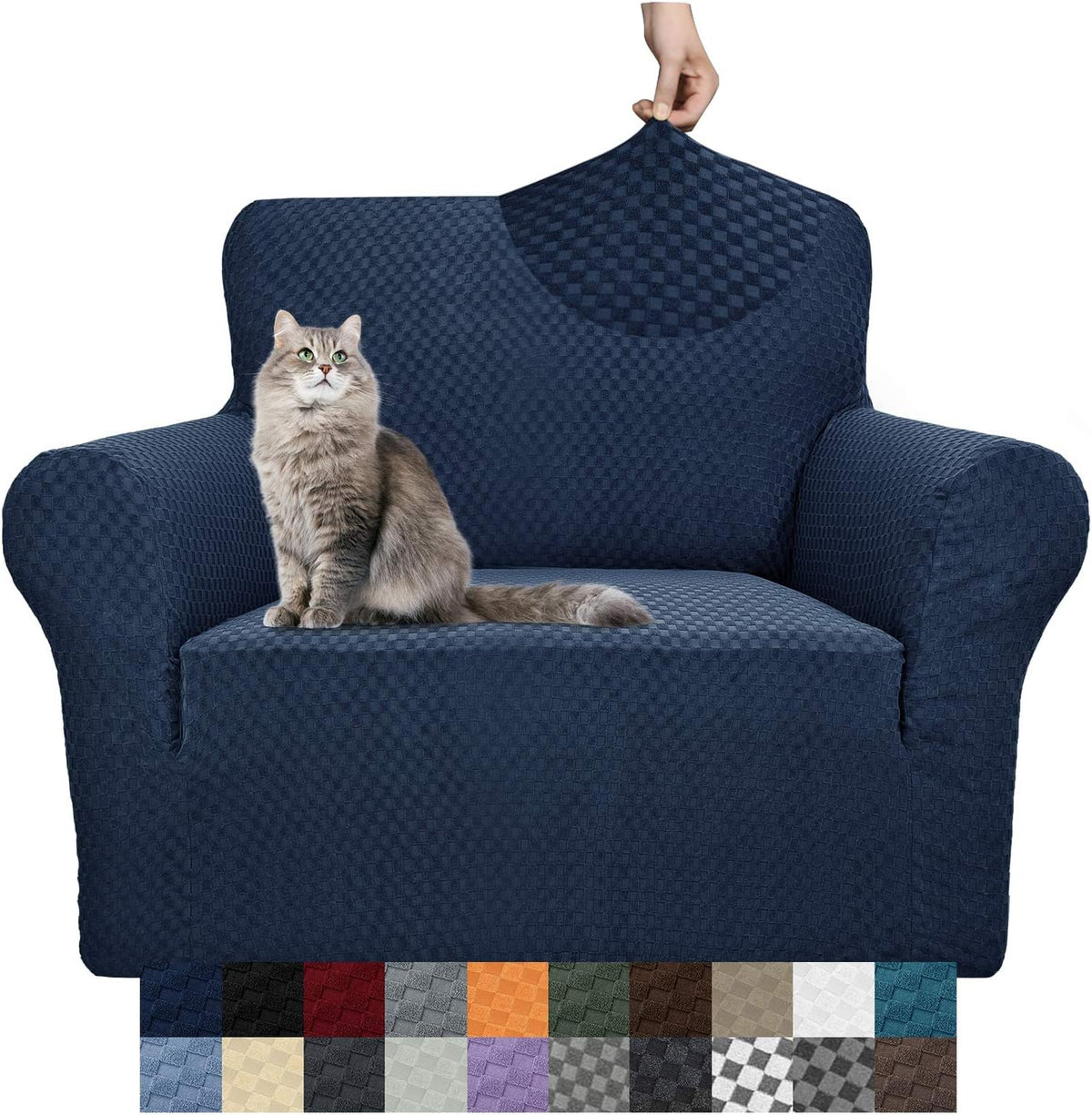 Navy textured stretch slipcover on a single-seat armchair with a gray cat on the cushion and a hand tugging fabric at the