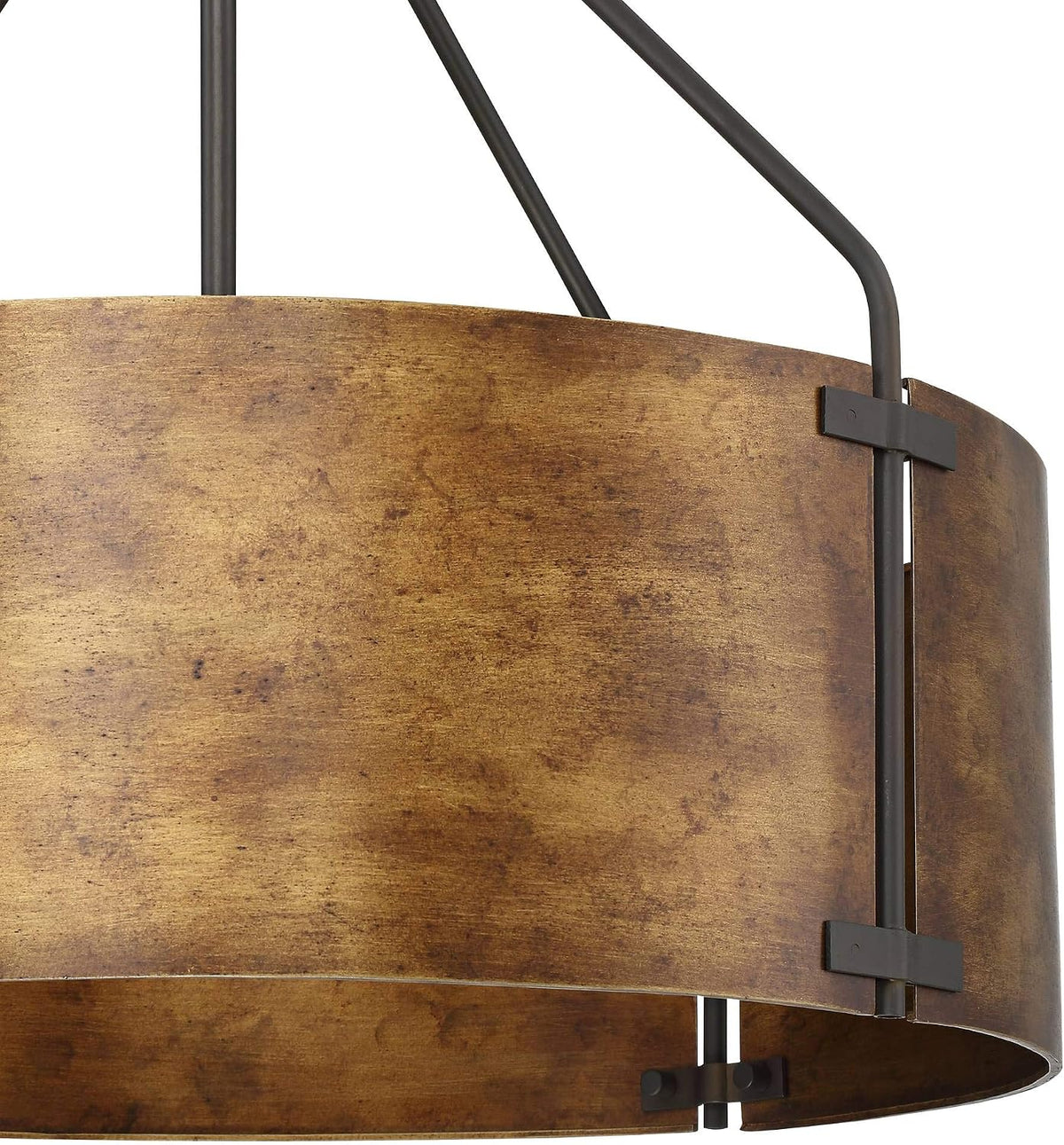 Macro view of the drum shade surface showing textured multi-tonal rustic bronze finish and metal fastener detail