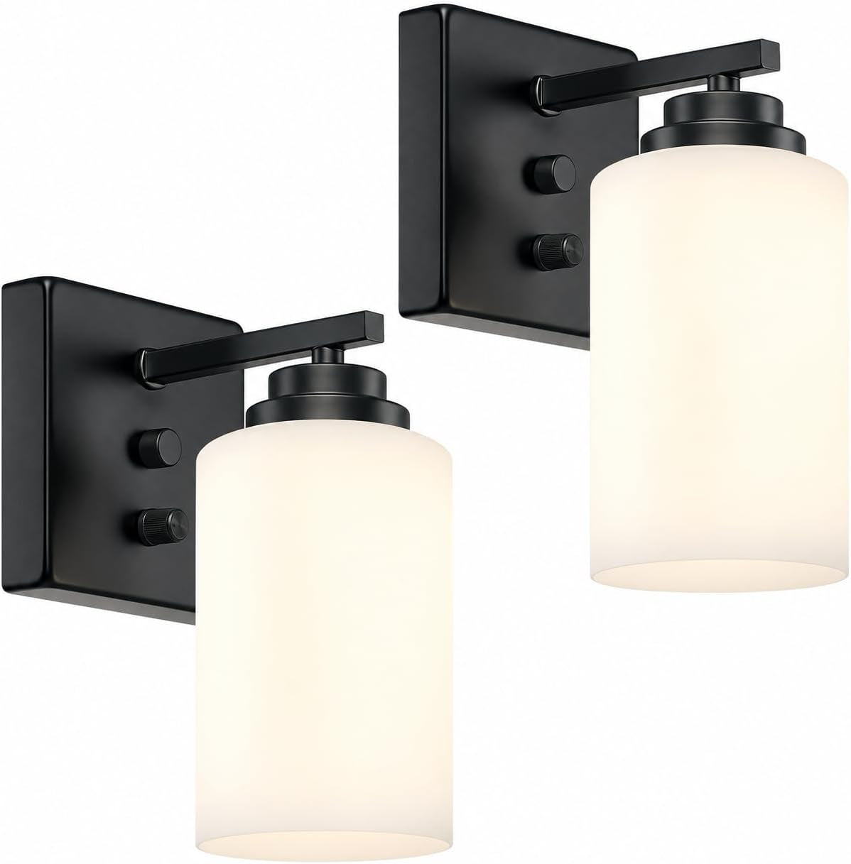 Two matte black wall sconces fitted with frosted white cylindrical shades, shown lit on white background.