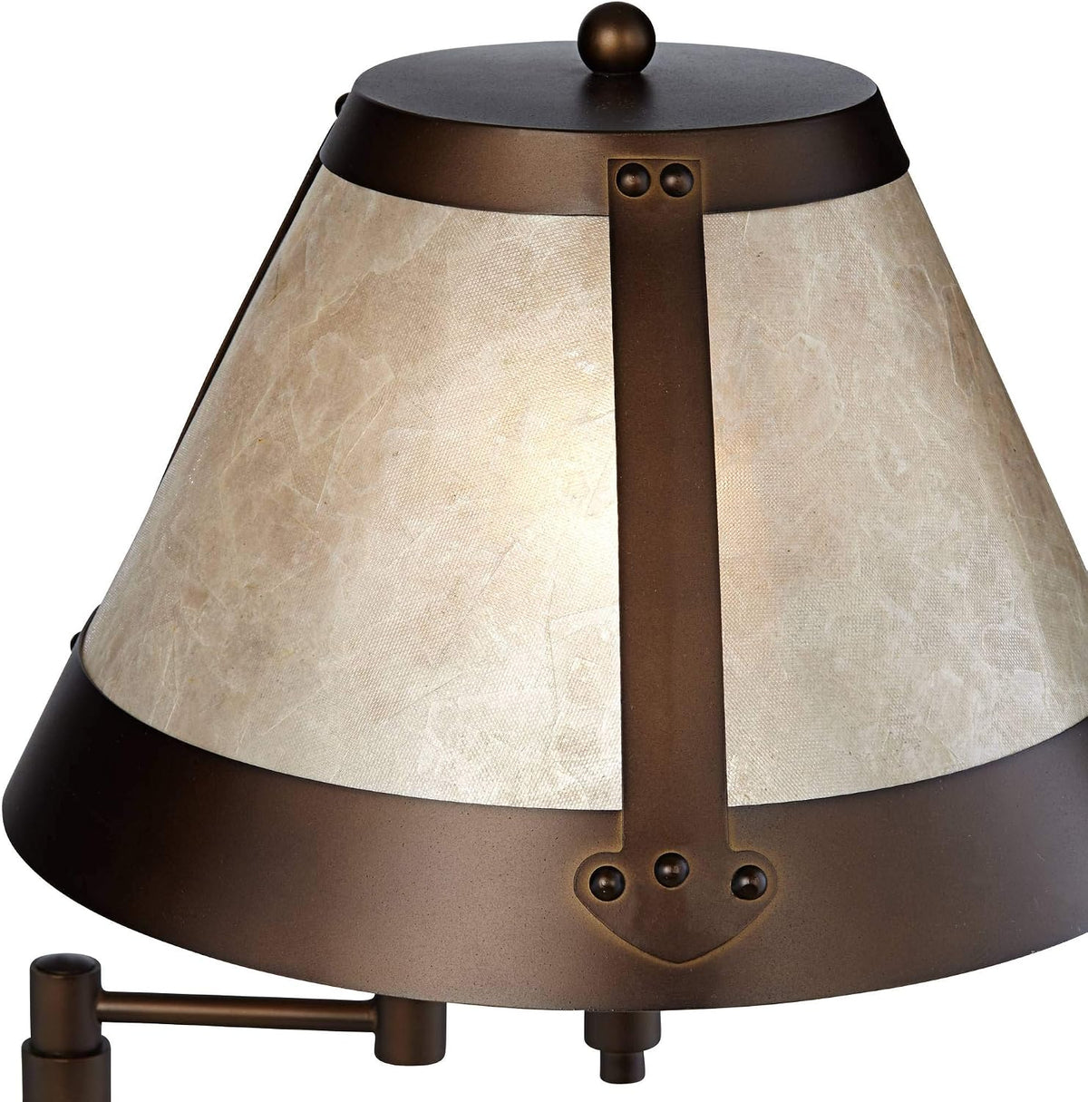 Close-up of natural mica lampshade showing cream tones and bronze metal trim