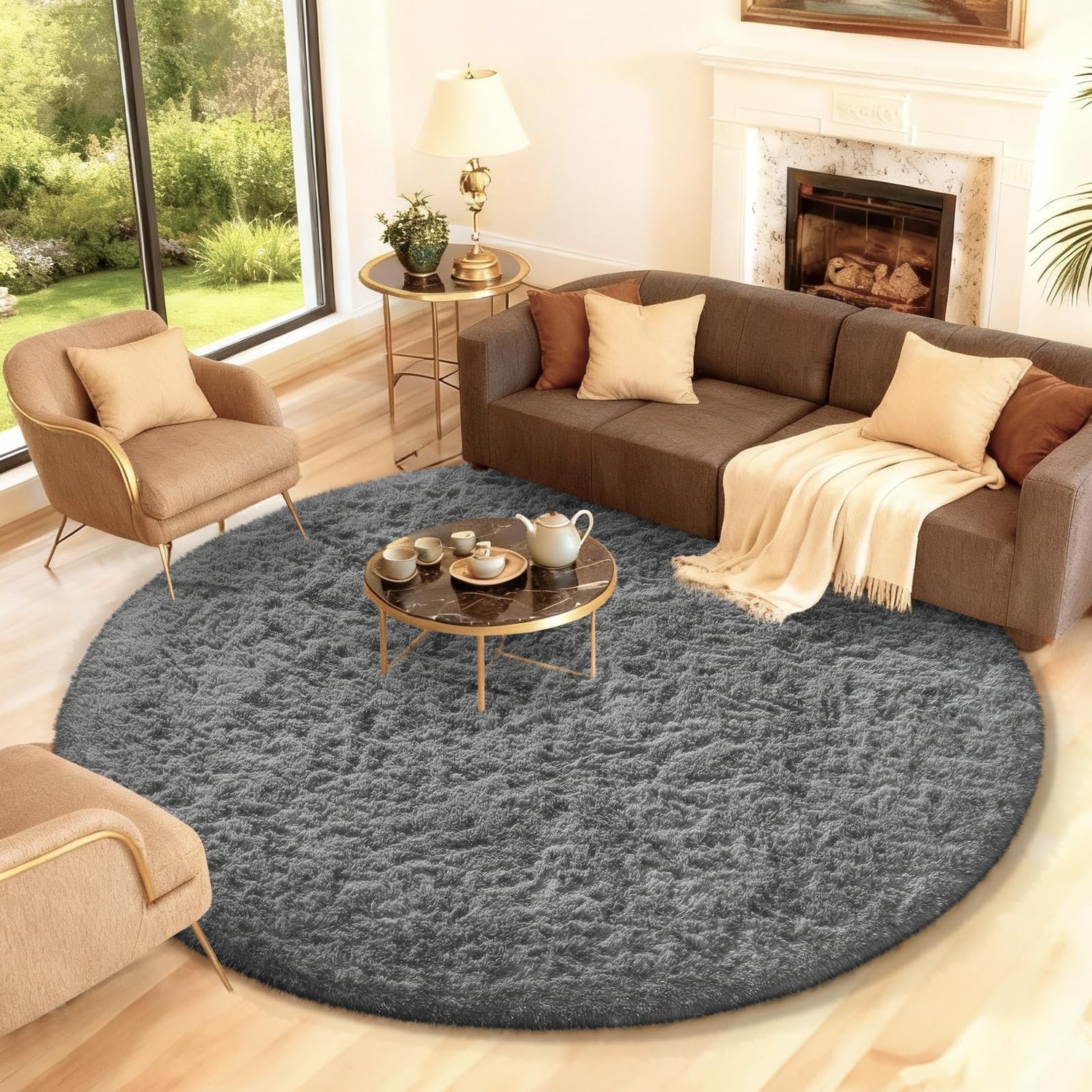 Cozy seating area with brown sofa, round dark gray shag rug and low round coffee table.