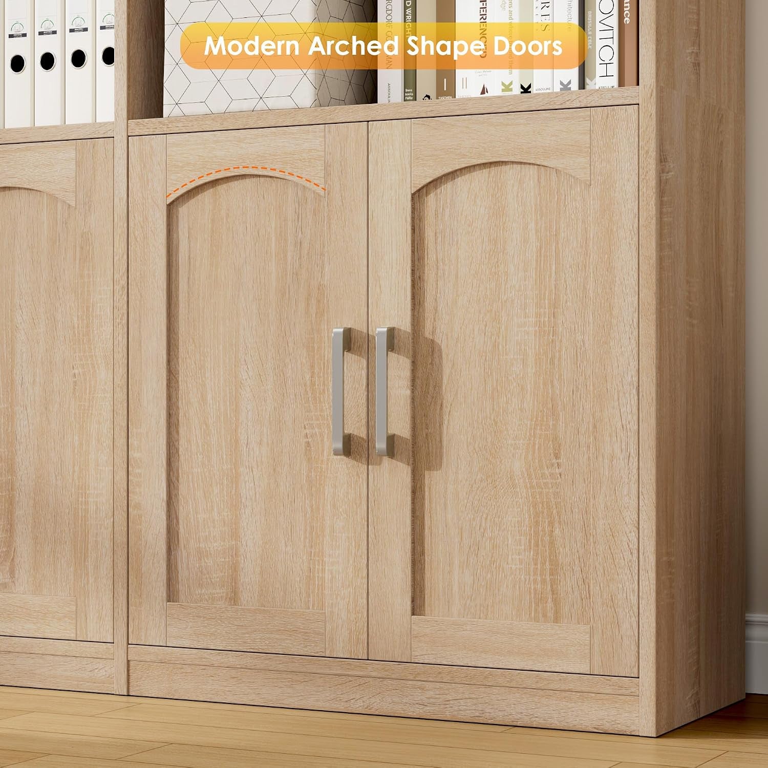 Close-up of lower cabinet doors showing arched-shaped door detail and silver bar handles on oak finish