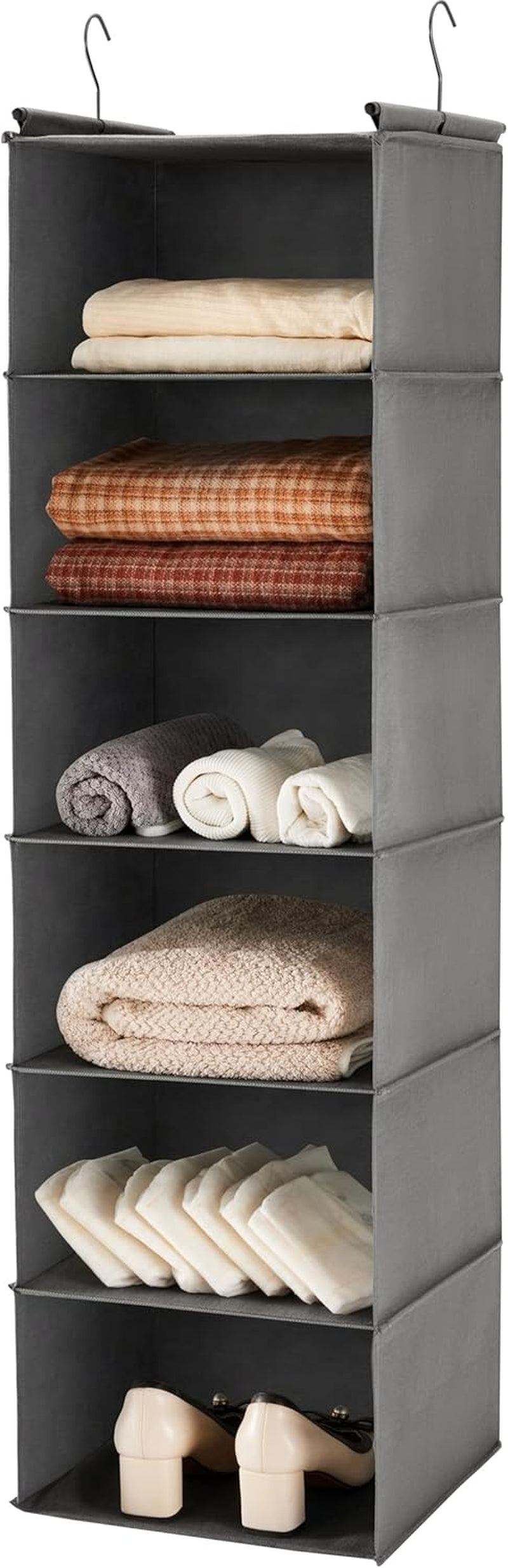 Grey fabric 6-tier hanging organizer close-up front view with folded blankets on shelves