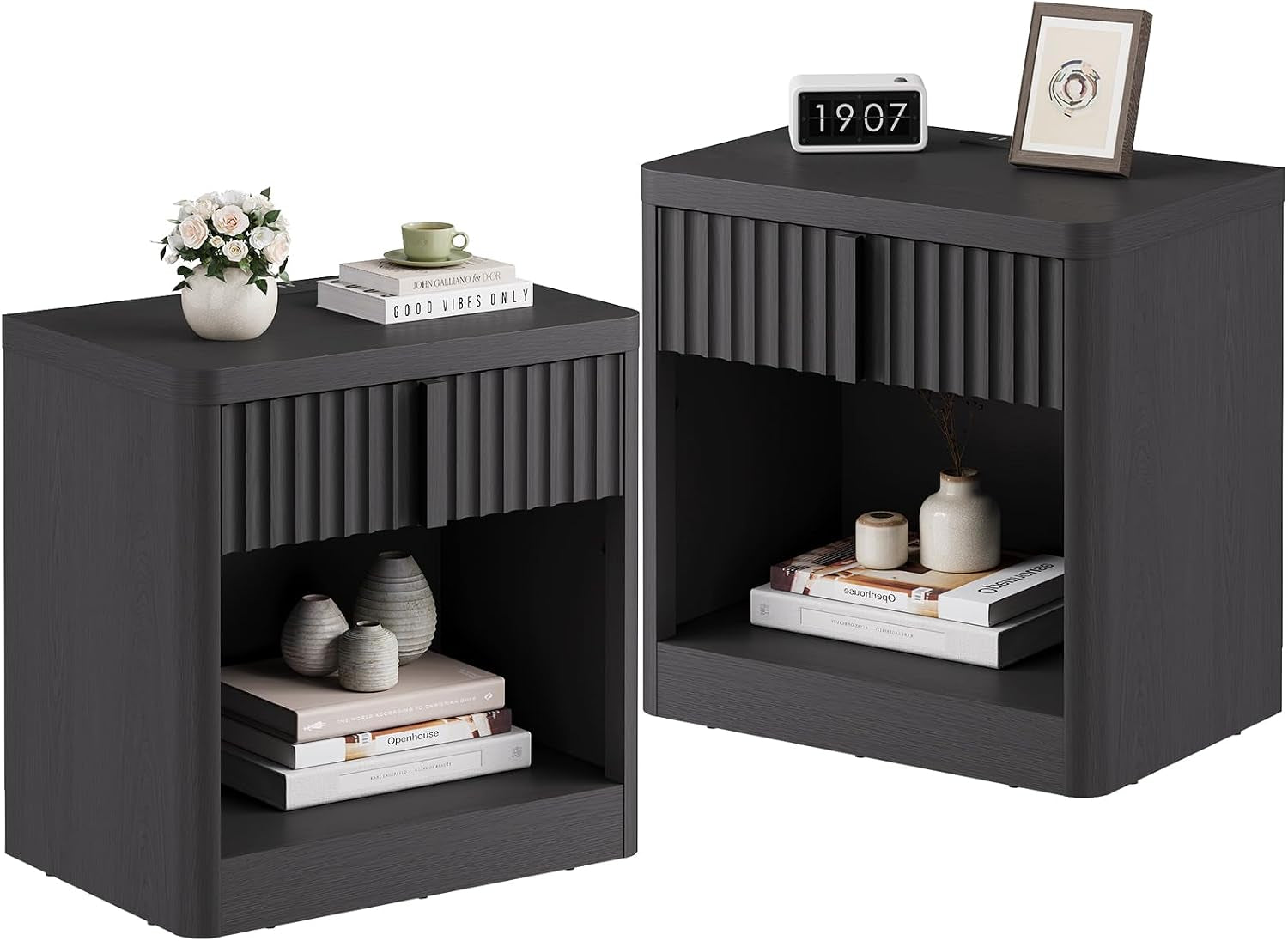 Two open-shelf fluted nightstands in dark charcoal with decorative books, vases, and a clock on top.