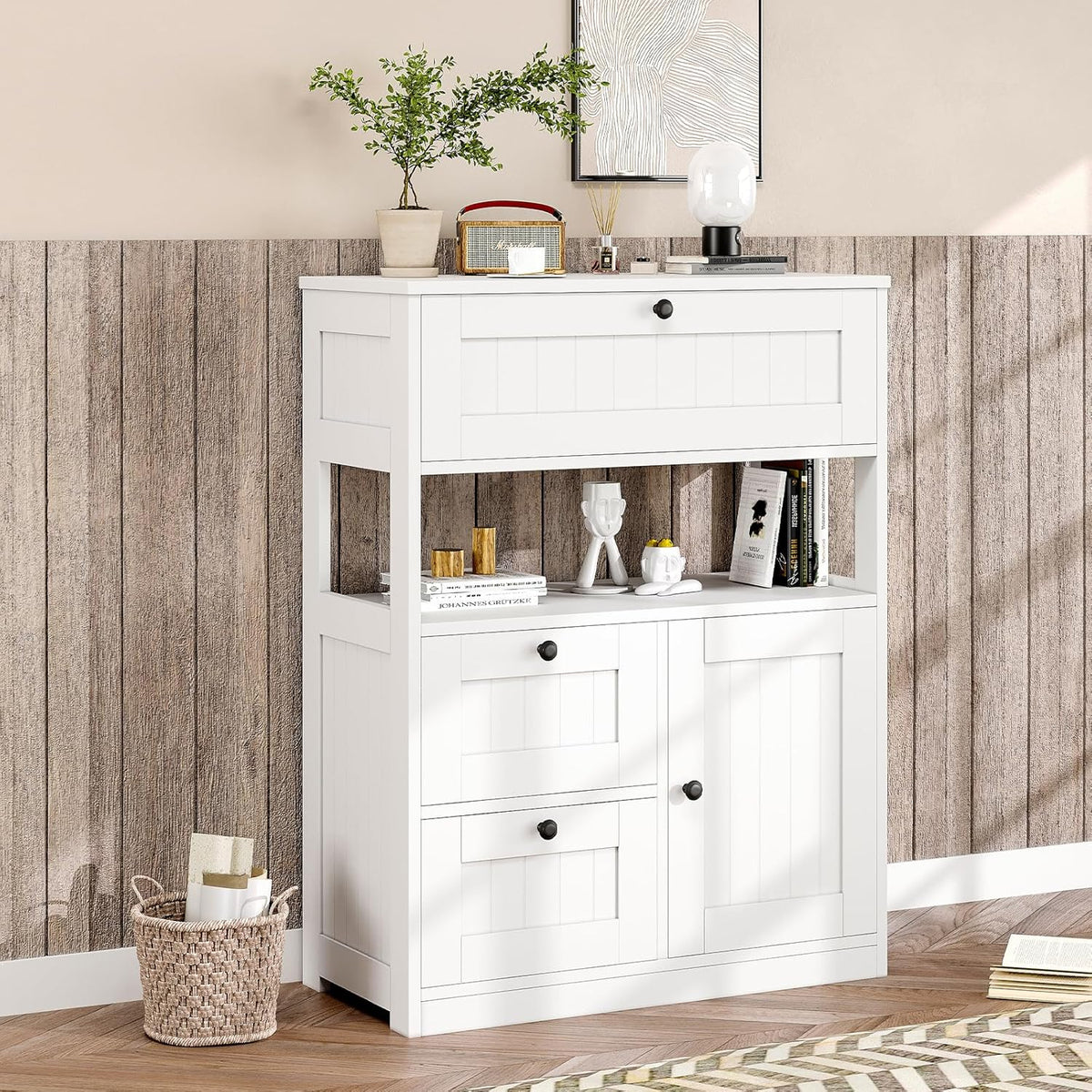 White beadboard freestanding cabinet angled front view in a styled room setting on hardwood floor