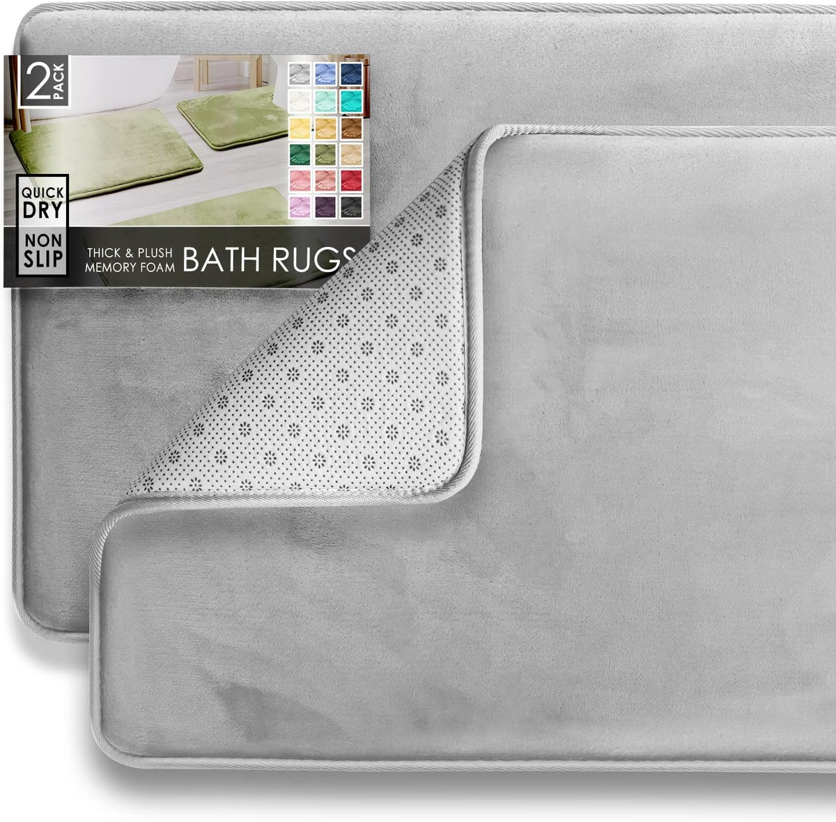 Two overlapping light-gray rectangular bath rugs shown flat, with the top corner turned to expose the white dotted non-slip