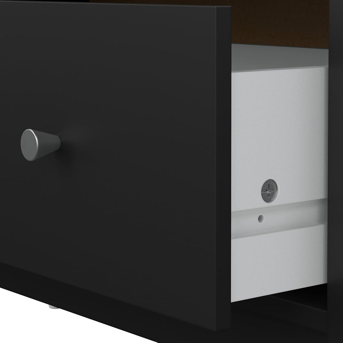 Detail showing black drawer front edge, white drawer box interior, and plastic glide hardware