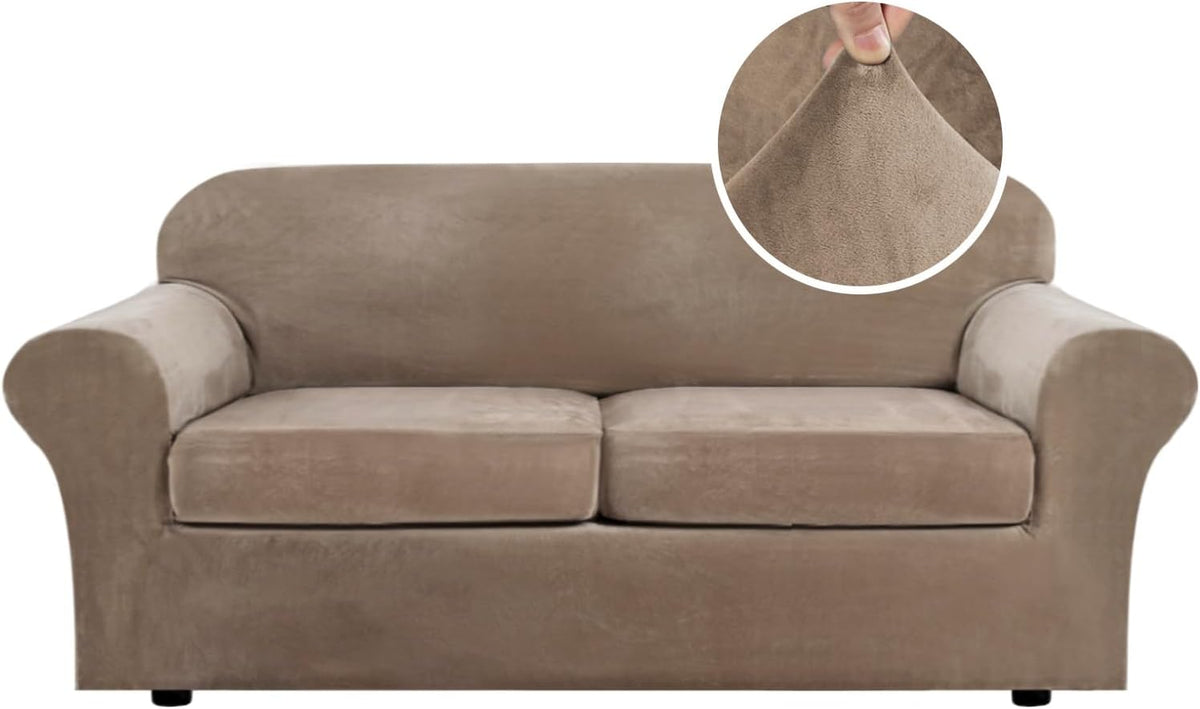 Front view of a three-cushion sofa covered in a light taupe stretch velvet slipcover with fabric texture inset.