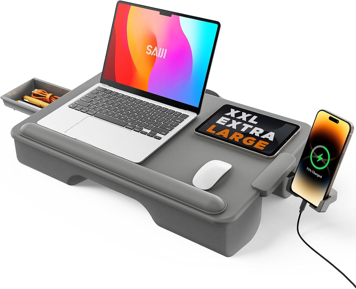 Gray lap desk holding laptop, tablet and phone in a charger mount with storage tray on left
