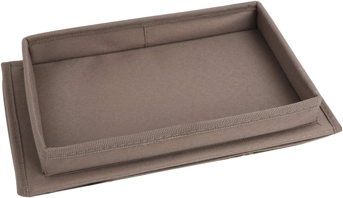 Close-up of a rectangular fabric tray with raised edges in a light brown/taupe color
