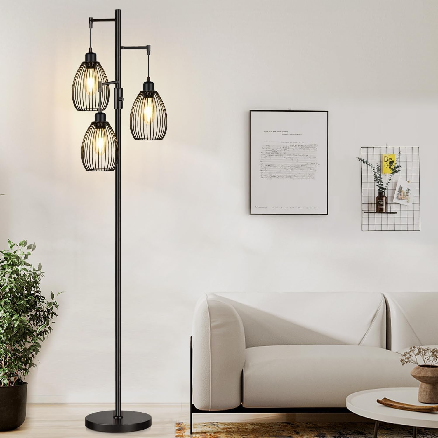 Black metal 70-inch floor lamp with three cage shades, front-left view in a bright living room