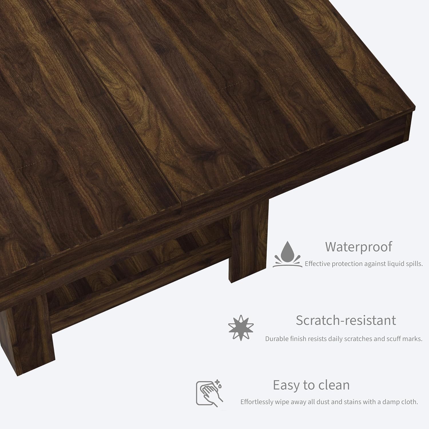 Close-up of table corner and lower shelf in dark walnut finish showing tabletop seam and icons for waterproof and easy-to‑cle