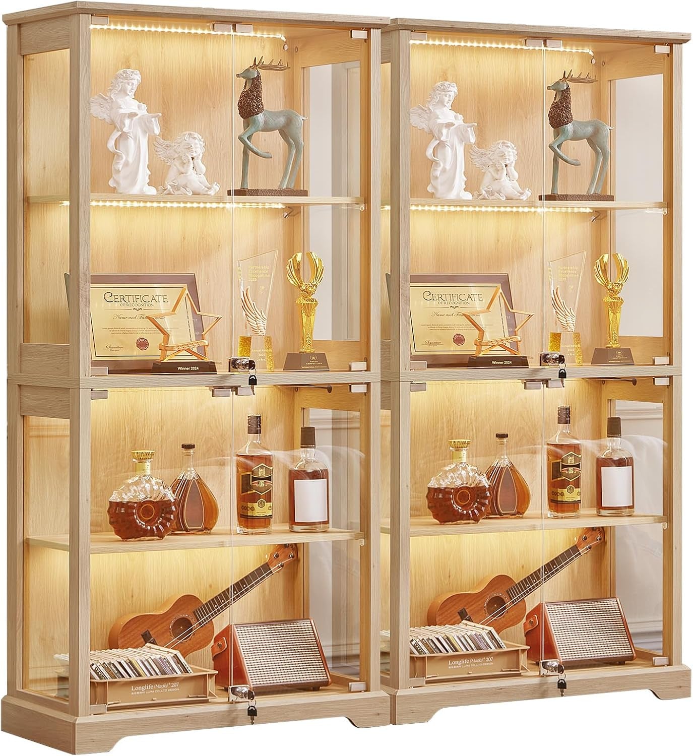Two identical walnut-finish glass display cabinets placed side-by-side, both with interior lighting