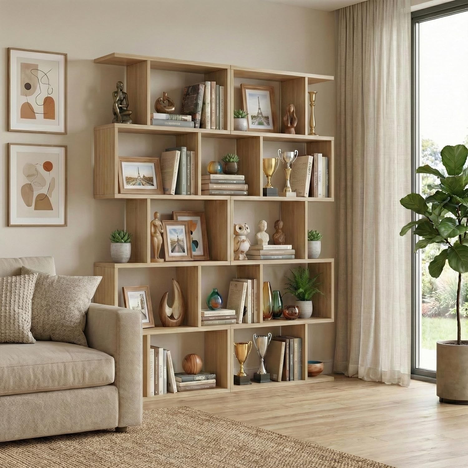 S-shaped bookcase set in oak finish shown beside a sofa and window, lifestyle angled shot