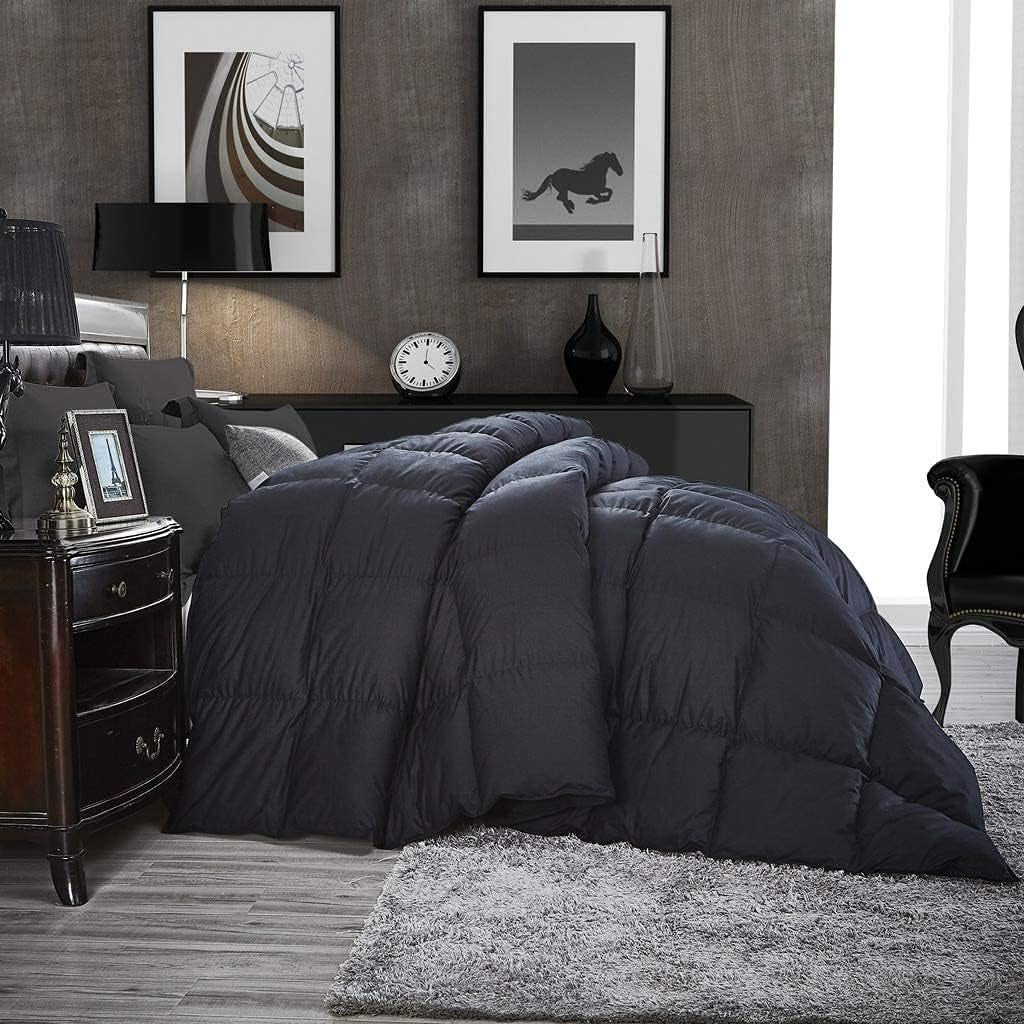 Black down comforter on a dark-styled bedroom bed, side view highlighting plush loft and fullness