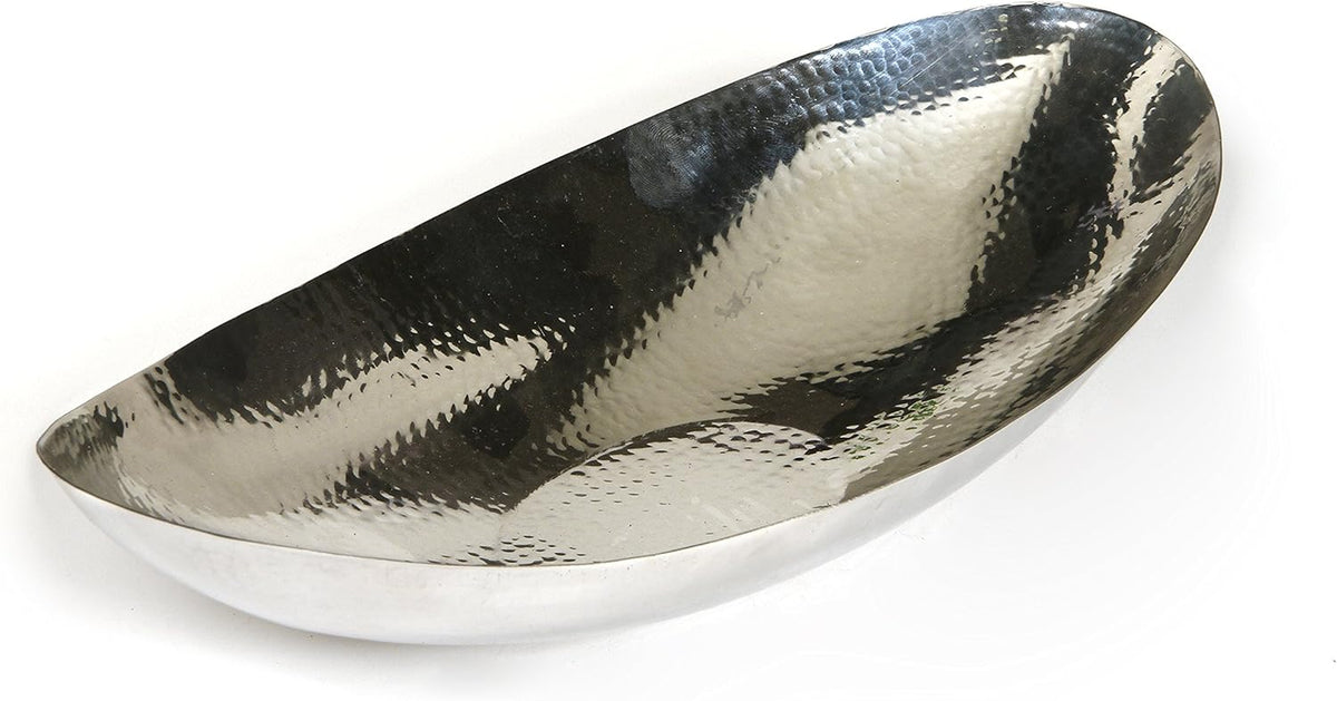 Top-angle view of the oval bowl interior showing hammered reflective texture and elongated oval shape
