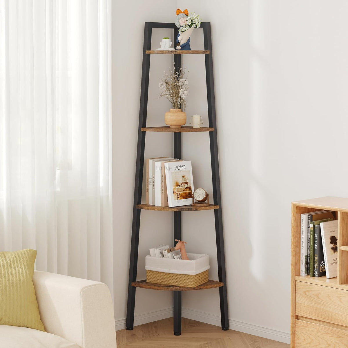 Close front view of the corner shelf with decorative vase, books and a small clock on the lower shelf near a sheer window.