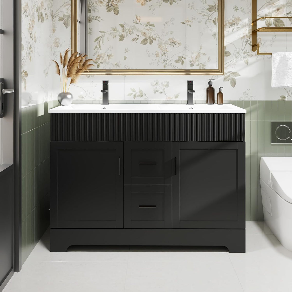 Wide front view of a black double-sink vanity with two faucets and fluted apron