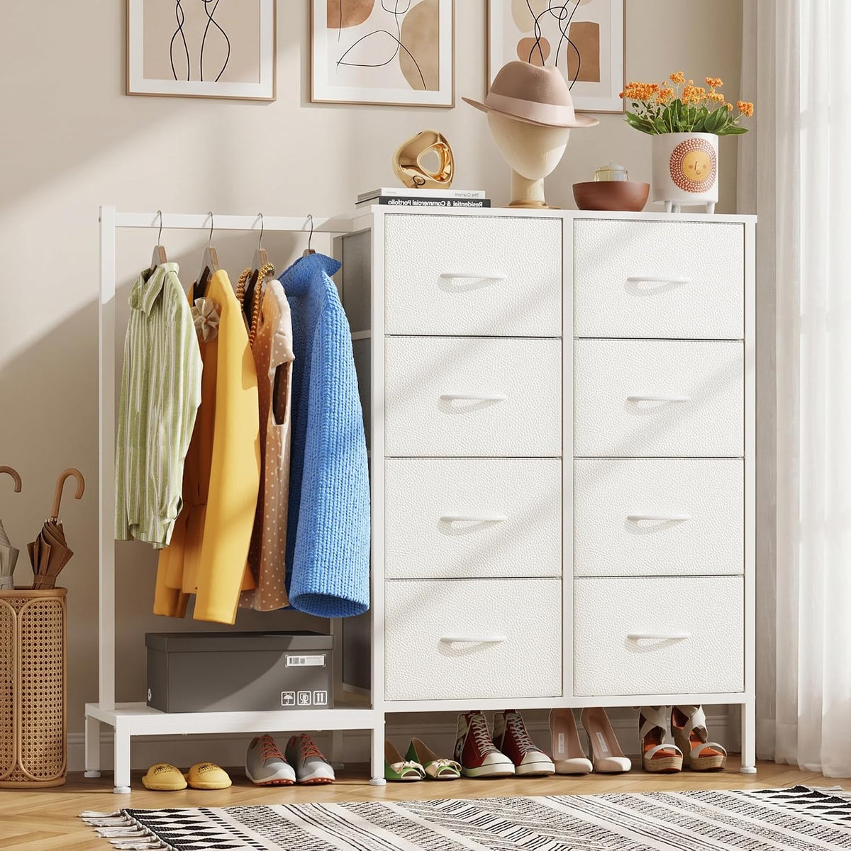 White dresser columns with hanging rod, jackets on hangers and shoes on the bottom shelf