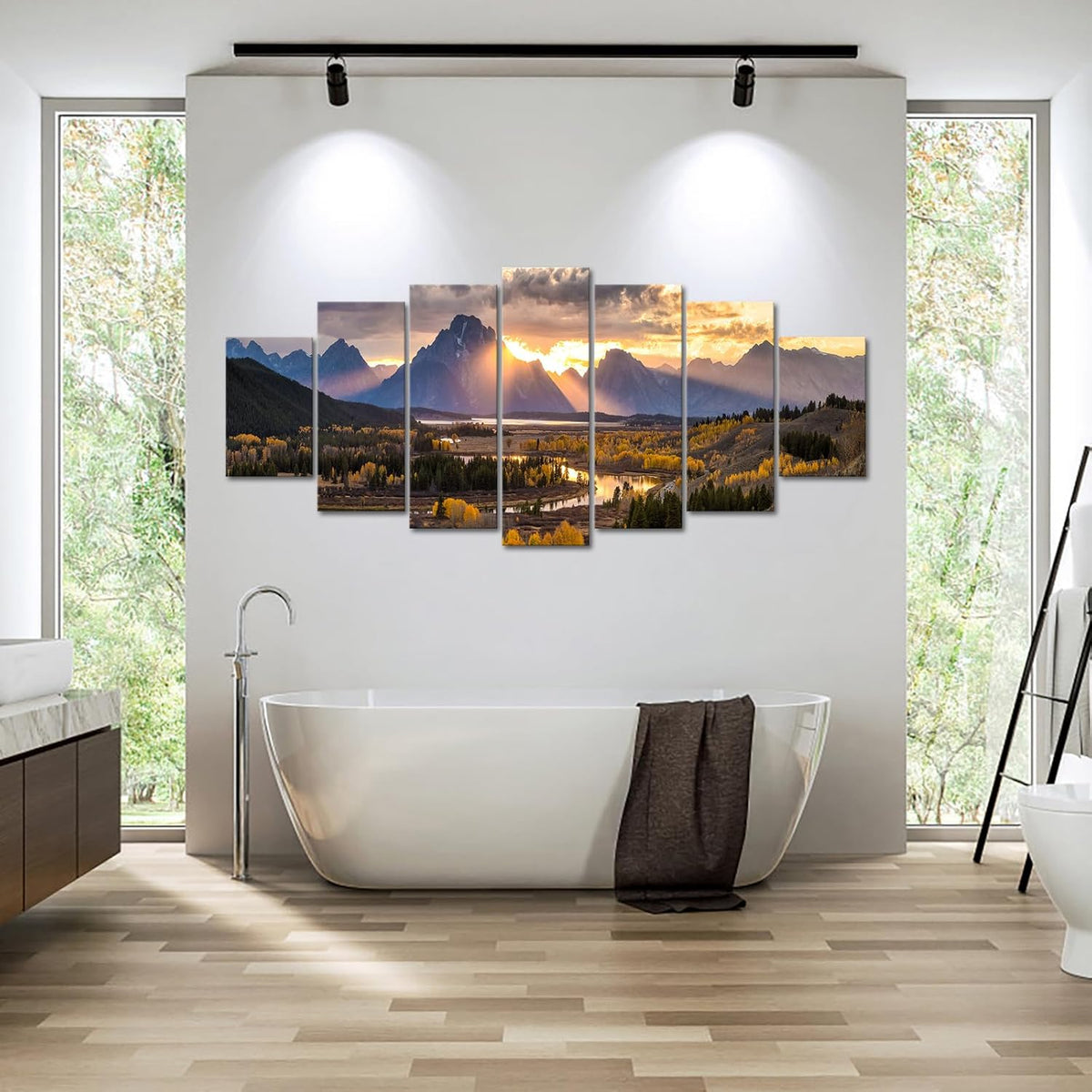 Seven-piece canvas panorama of Grand Teton installed above a freestanding bathtub in a bright bathroom