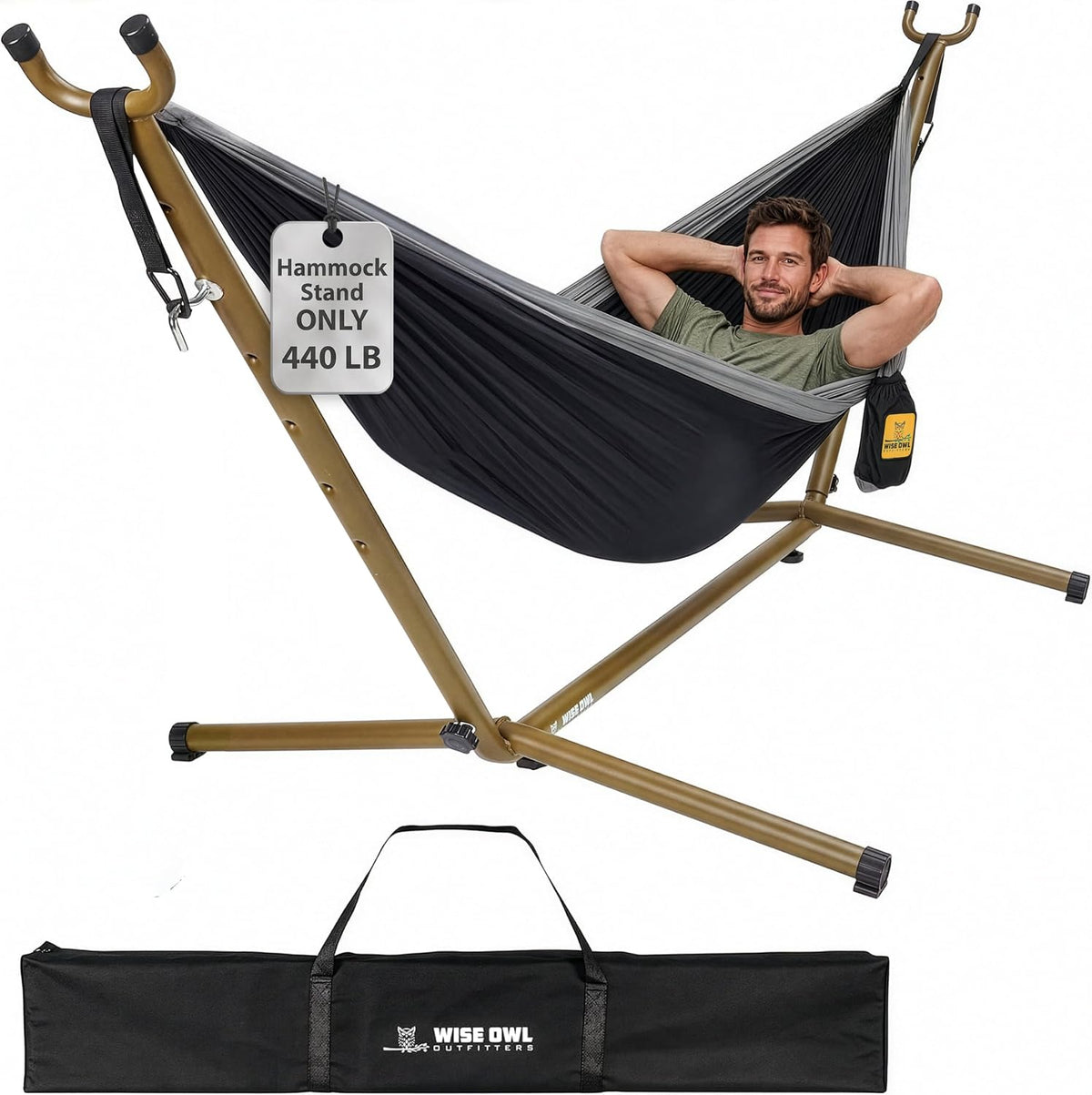Gold steel hammock stand with black hammock and man reclining, carry case shown beneath the frame