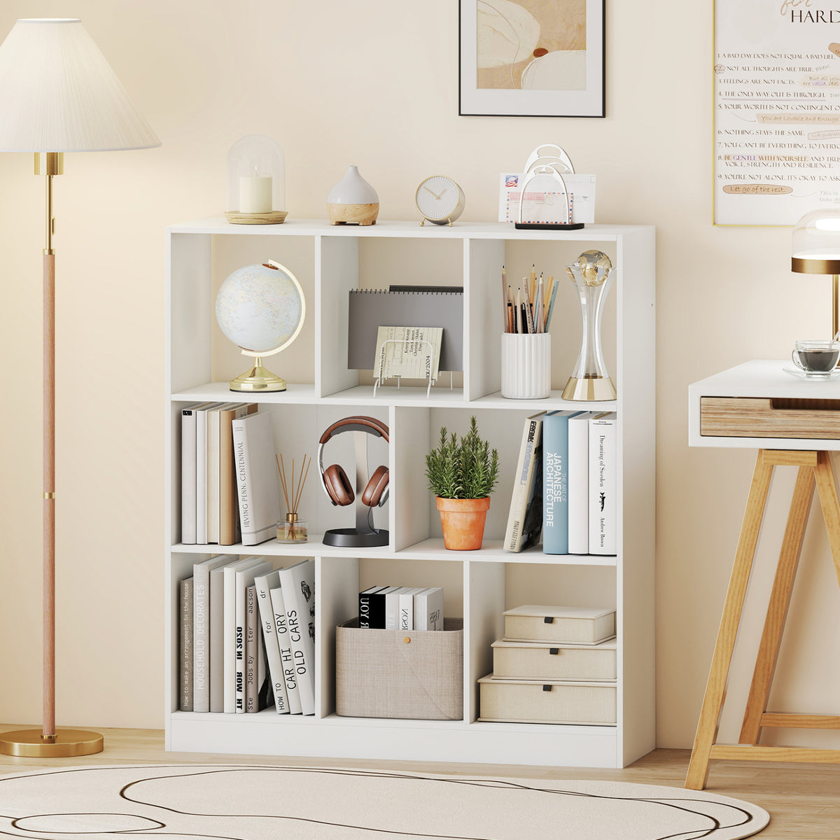 White cube bookcase styled with books and decor in a bright living room.