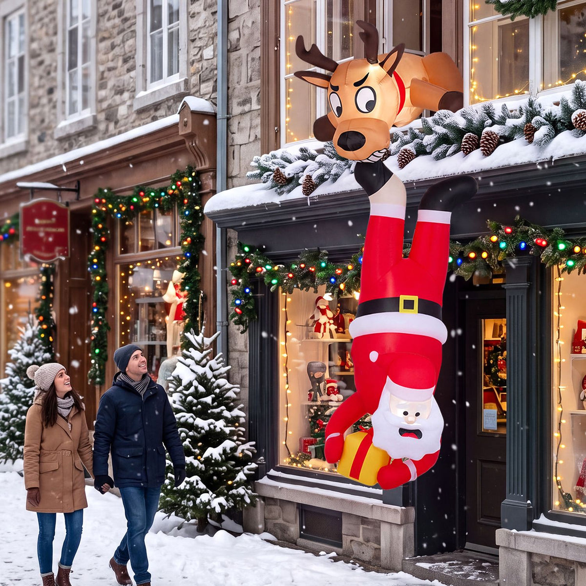 Inflatable reindeer and upside-down Santa display outside a snowy shop as two people walk past.