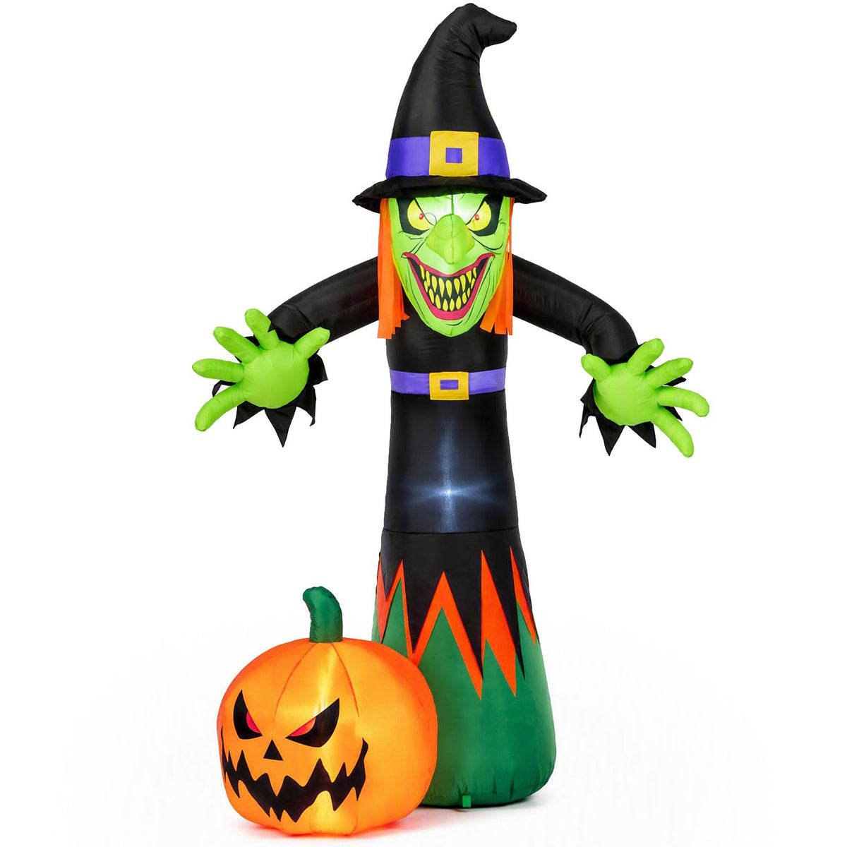 A black-hatted inflatable witch with green hands stands behind an orange jack-o'-lantern on white.