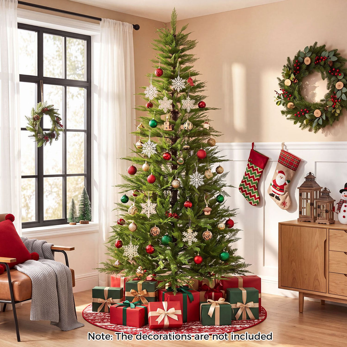 An artificial tree with colorful ornaments and lights stands among holiday decorations and presents.