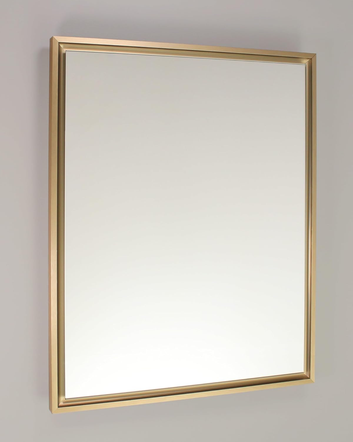 Gold framed mirror front view mounted on a wall showing the raised-edge frame and rectangular mirror surface