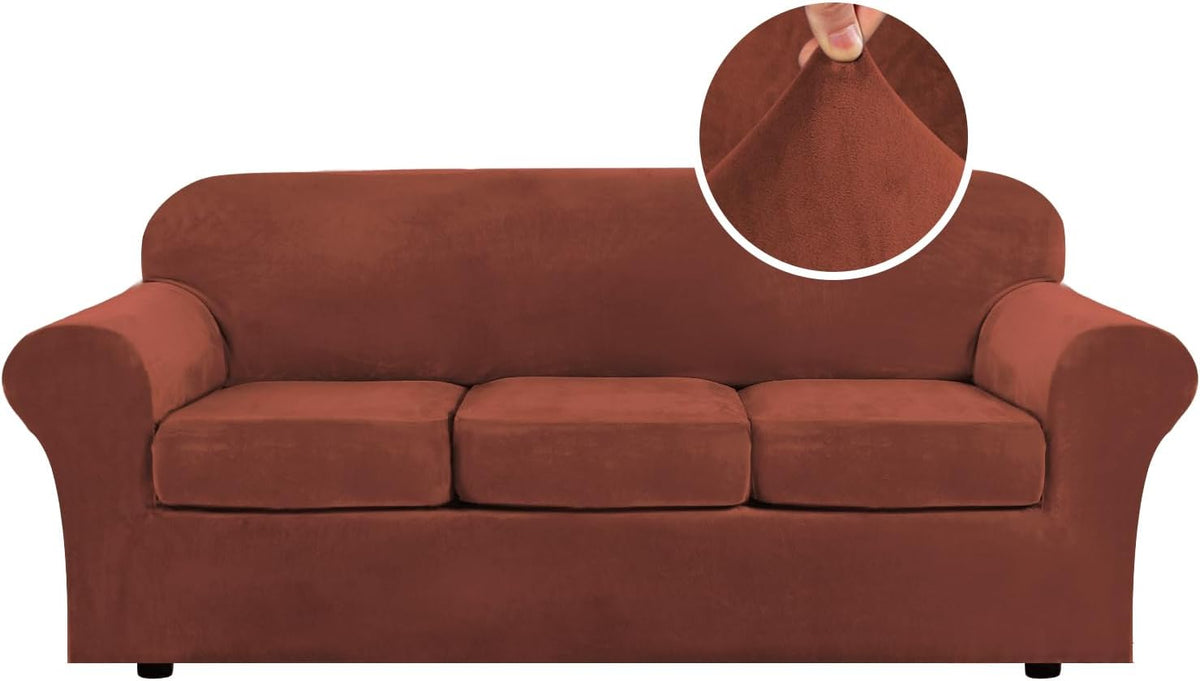 Front-facing three-seat sofa in warm rust-red velvet cover with a circular close-up of the plush fabric at upper right.
