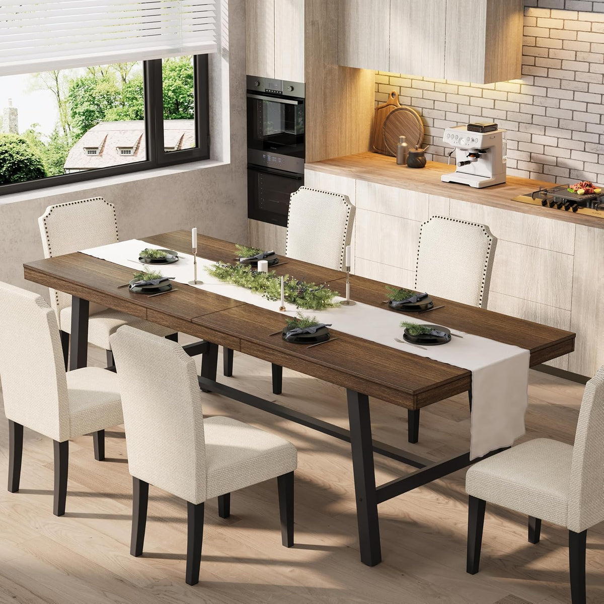 Dining room scene showing an extendable wood-top table with black metal legs and light wood finish