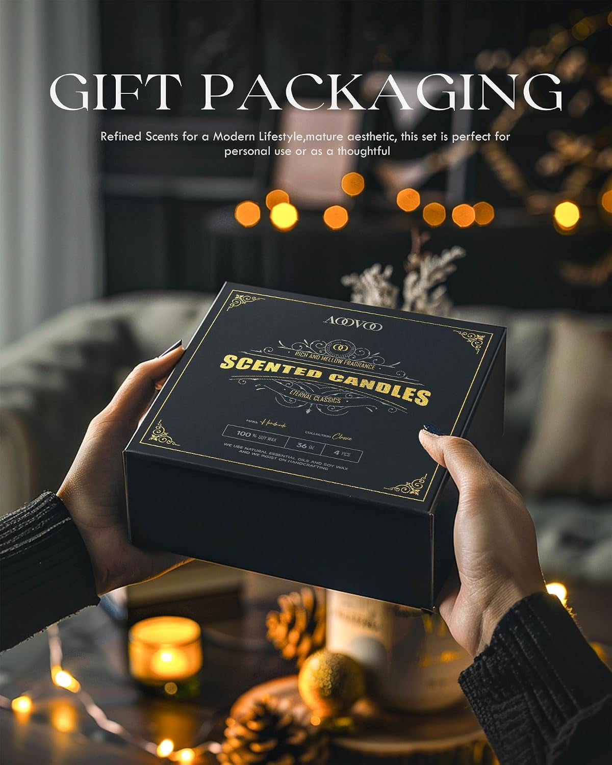 Hands presenting a black gift box with gold lettering over a blurred tabletop scene and warm bokeh lights.