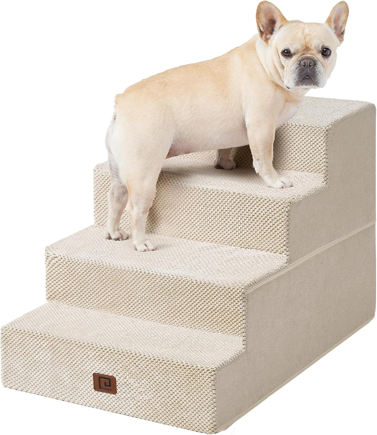 Front three-quarter view of a cream-colored dog standing on light beige textured four-step pet stairs