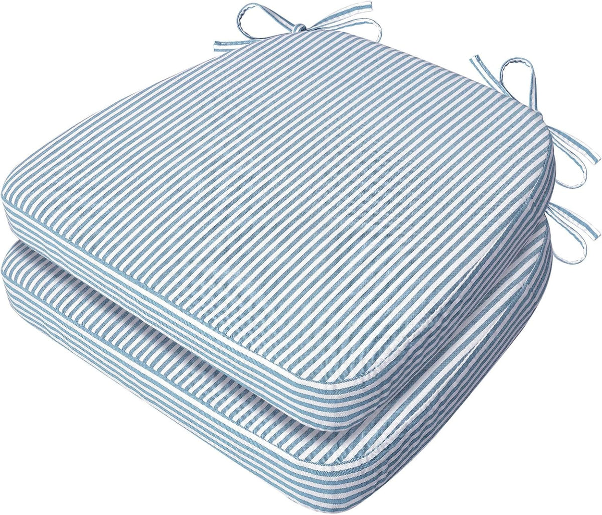 Two light blue-and-white striped D-shaped cushions stacked, shown from a low angled perspective.