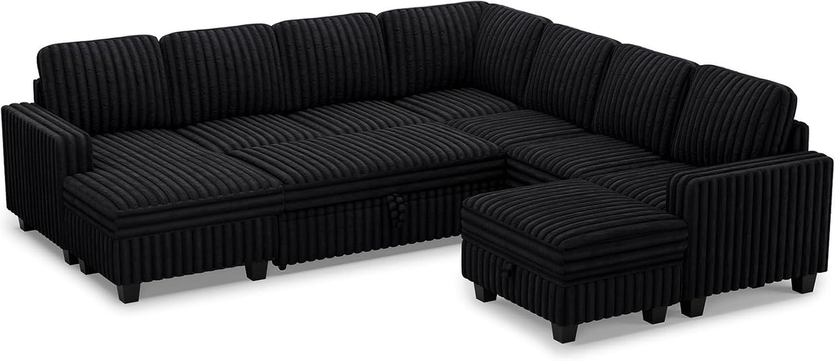 Isolated black L-shaped modular sectional with separate ottoman on a white background