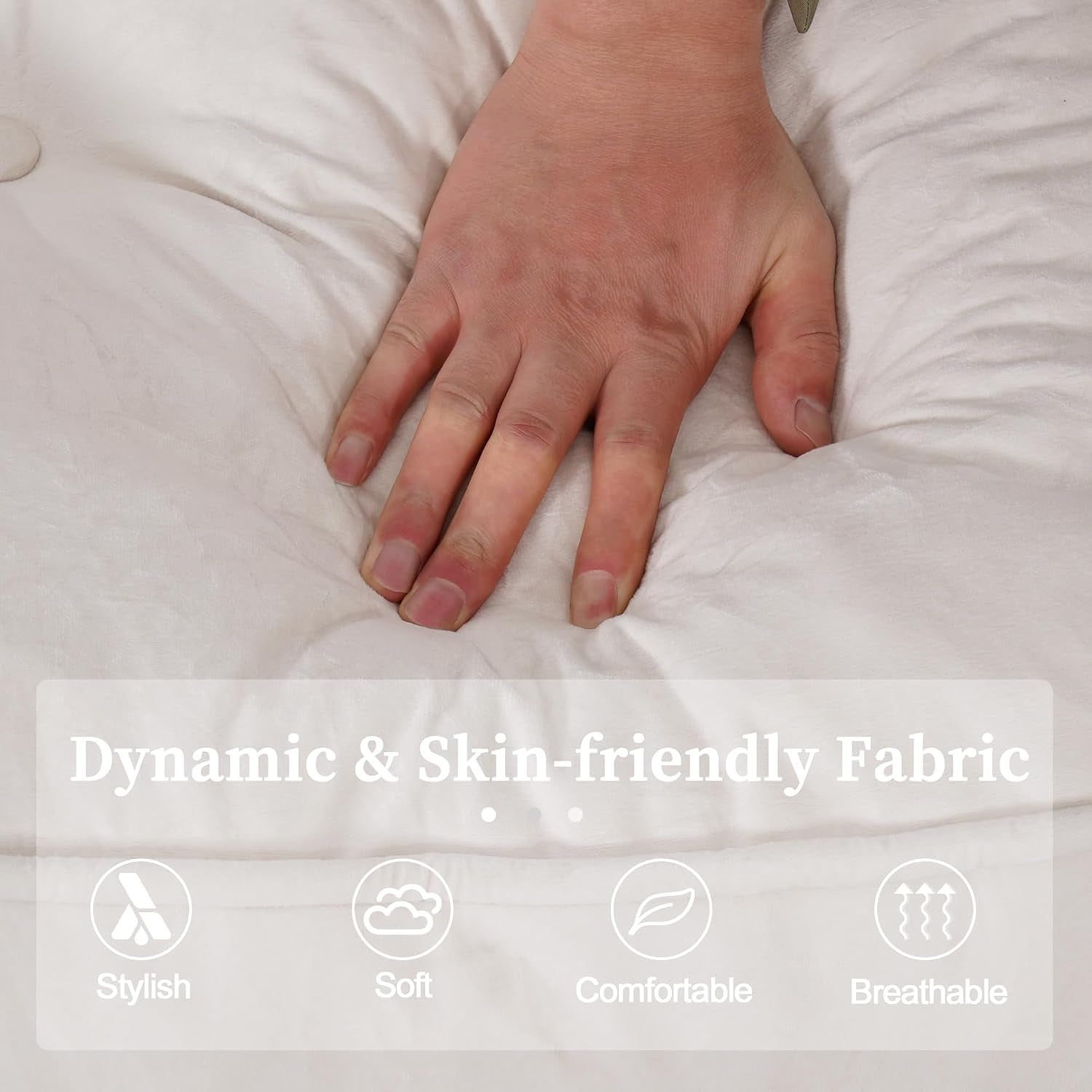Close-up of a hand pressing into tufted light fabric showing soft, padded texture.