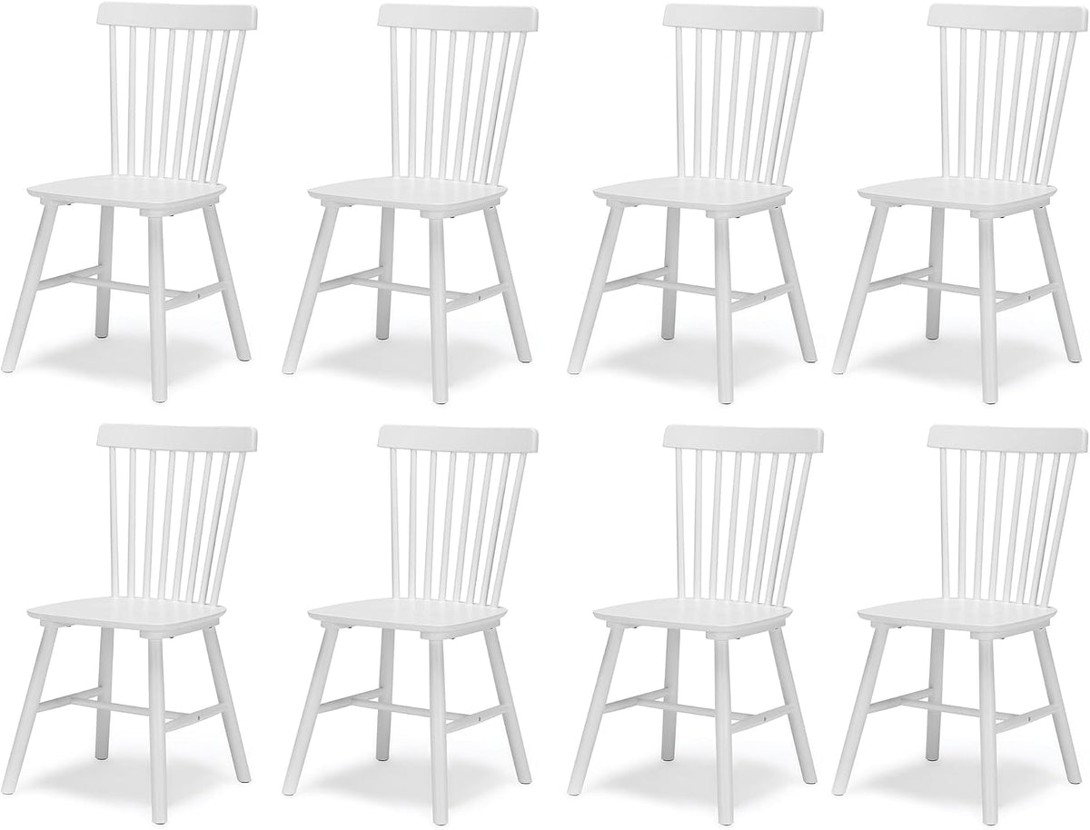 Eight white spindle-back wooden dining chairs arranged in two rows on a plain background.