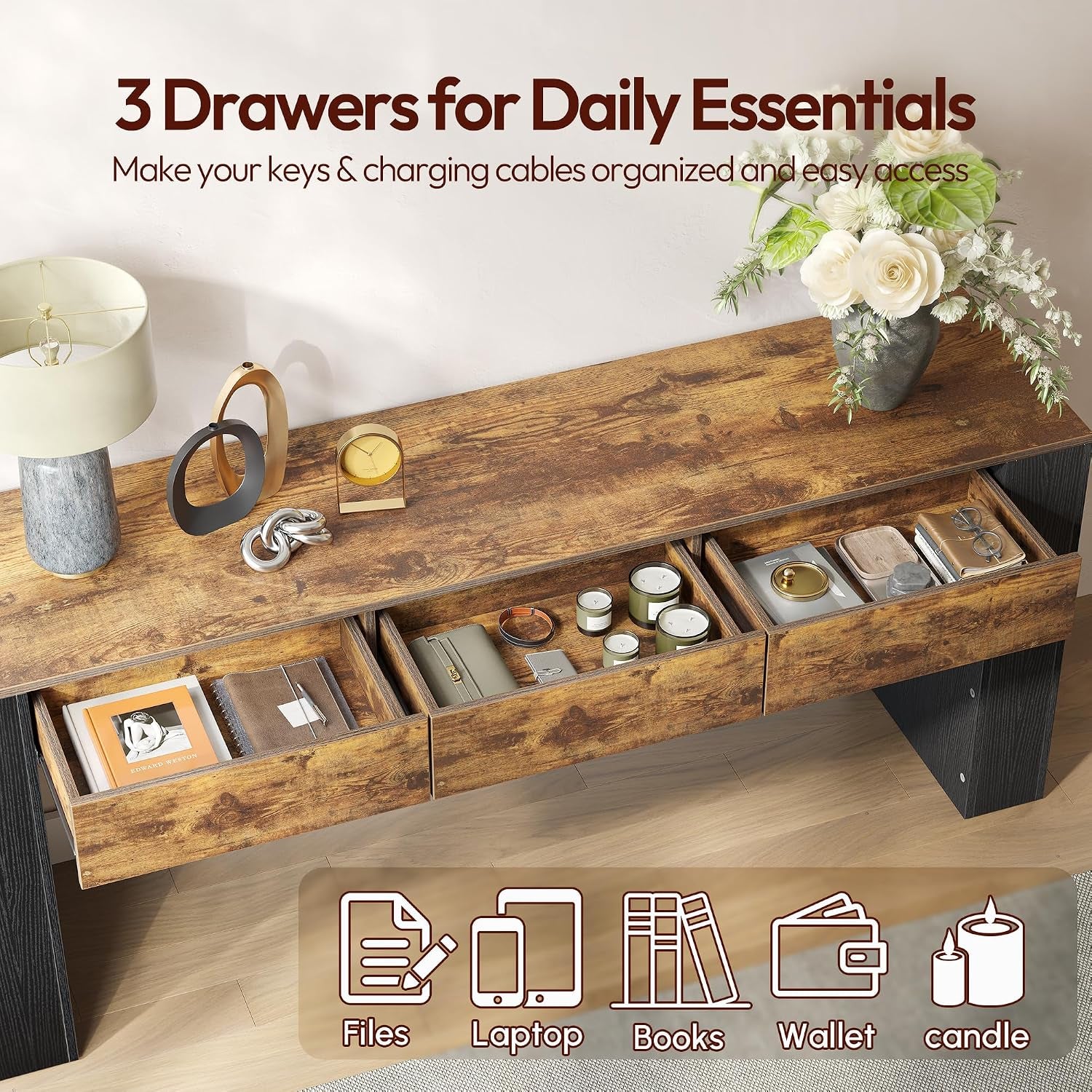 Close-up of the three drawers pulled open on the console table showing organized daily essentials inside