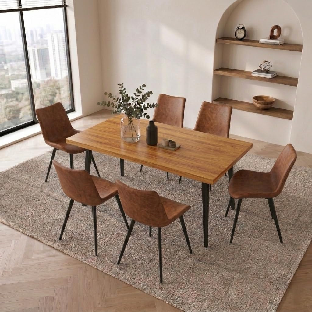 Three-quarter overhead view of the full dining set in a bright room with rug and window.