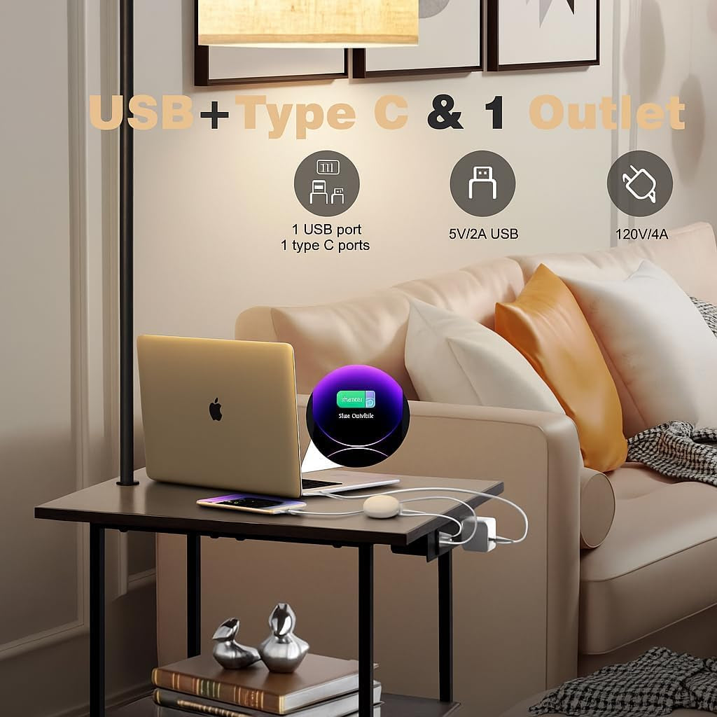 Side view of lamp and table next to sofa highlighting USB-A, USB-C and AC outlet on the table edge