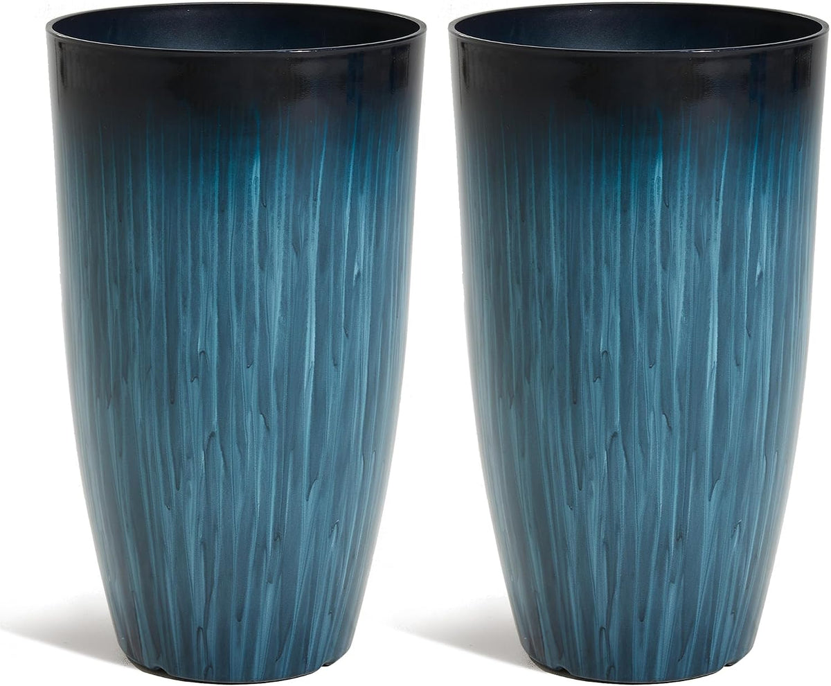Close-up front view of two tall blue gradient planters showing glossy finish and vertical textured streaks